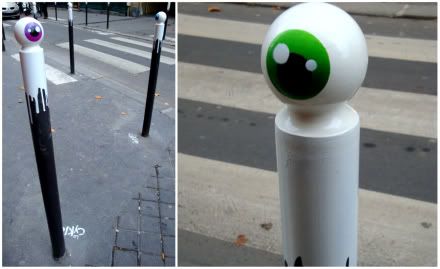 Cyclop cycklop cyklop Rue keller bastille paris performance street art artiste peinture potelet poteau anti-stationnement oeil vert aena